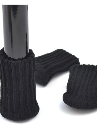 Black table and chair leg covers on a white background with text about size and fit.