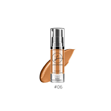 Foundation bottle with applicator on a white background