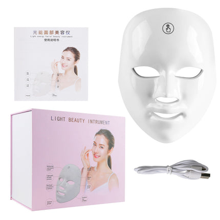 Light beauty instrument with packaging, mask, and cable on a white background