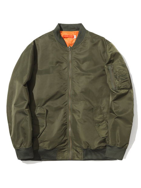 Green bomber jacket with orange lining on a white background
