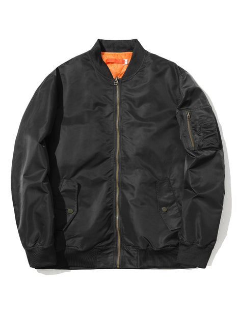 Black bomber jacket with orange lining on a white background