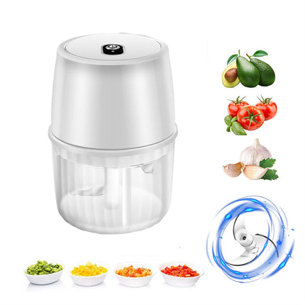 White food chopper with images of vegetables and a fan on a white background