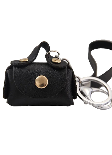 Mini PU handbag keychain coin purse with compact leather design.