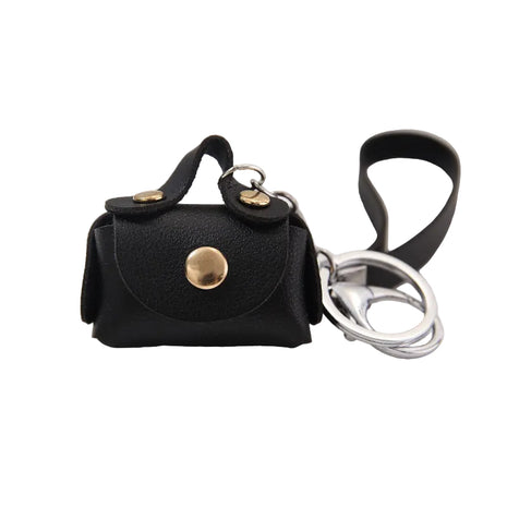 Mini PU handbag keychain coin purse with compact leather design.