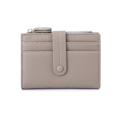 Minimalist small wallet featuring button closure and organized card storage.
