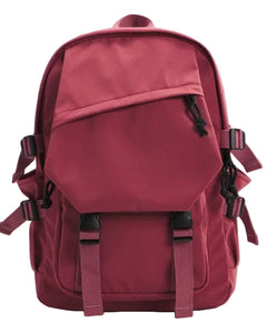 Maroon backpack on a light gray background