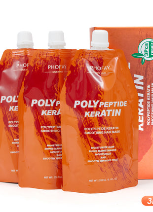 Three orange packets of PolyPeptide Keratin hair mask with a box in the background on a white background.