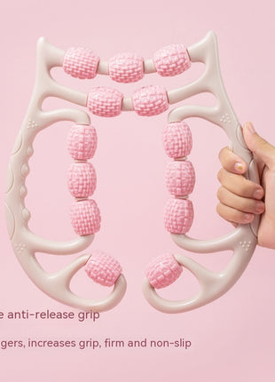 Pink and white anti-release grip tool held by a hand on a pink background