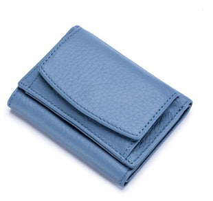 Premium first-layer cowhide mini wallet designed for cards, cash, and coins.