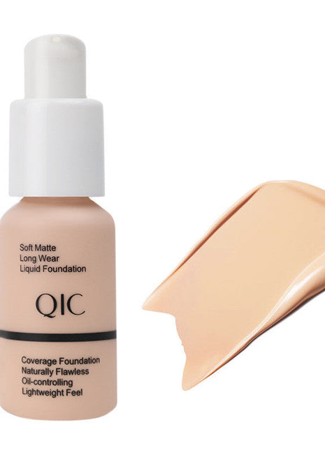 QIC foundation bottle with a swatch of Nude #02 shade on a white background