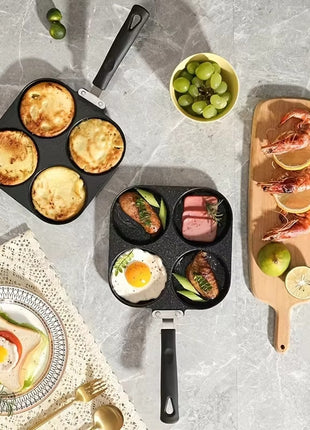 Assorted breakfast items including muffins, eggs, and meats on a gray surface.