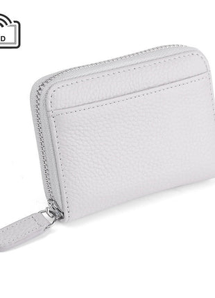RFID leather card wallet made from first layer cowhide with multi-card storage capacity.