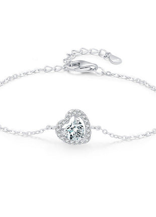 Silver bracelet with a heart-shaped diamond