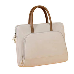 Light gray handbag with brown handle on a beige background