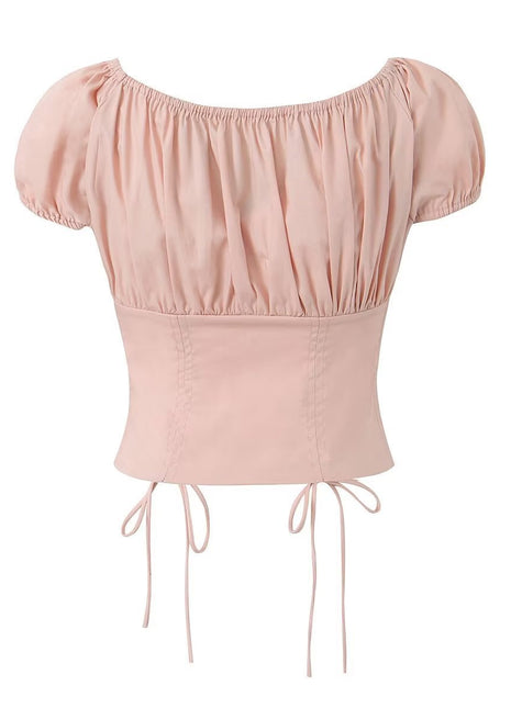 Short-sleeve pink cropped blouse with adjustable drawstring front and delicate lace detailing.