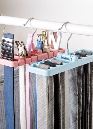 Clothing organizer with multiple hooks holding various items on a rack.