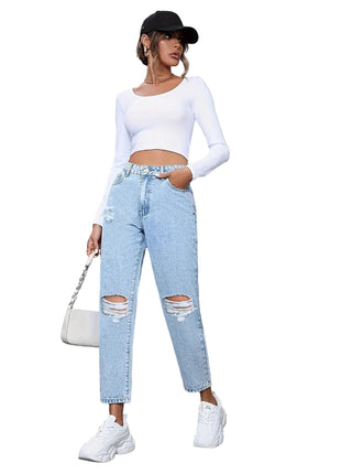 Women’s street style loose denim jeans with distressed finish and modern casual silhouette.