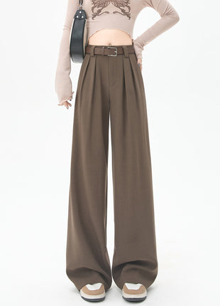 Brown wide-leg pants worn by a person on a white background