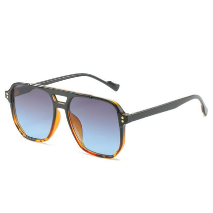 Sunglasses with a tortoiseshell frame and blue gradient lenses on a white background