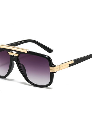 Sunglasses with black frame and gold accents on a white background