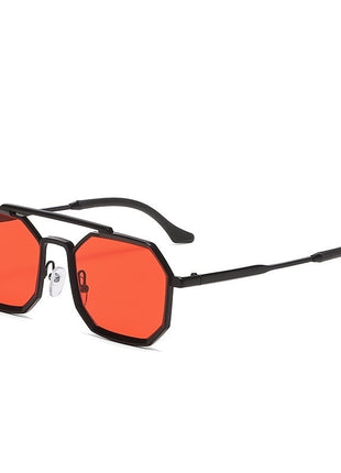 Sunglasses with black frame and red lenses on a white background