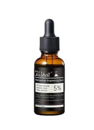 Tea Shell serum bottle with dropper on a white background