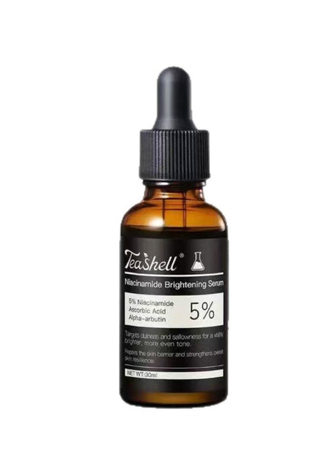 Tea Shell serum bottle with dropper on a white background
