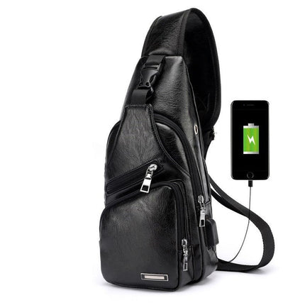 Black leather sling bag with USB charging port on a white background