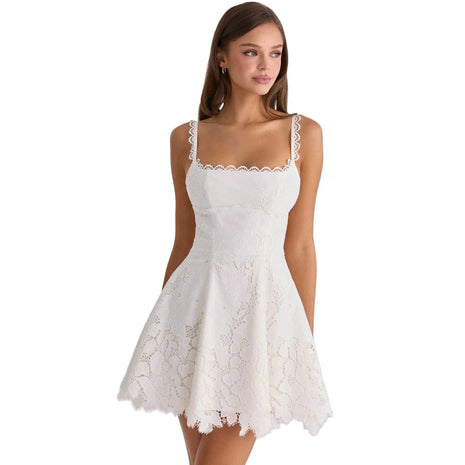 White women's backless mini dress with lace trim designed for summer occasions and parties.
