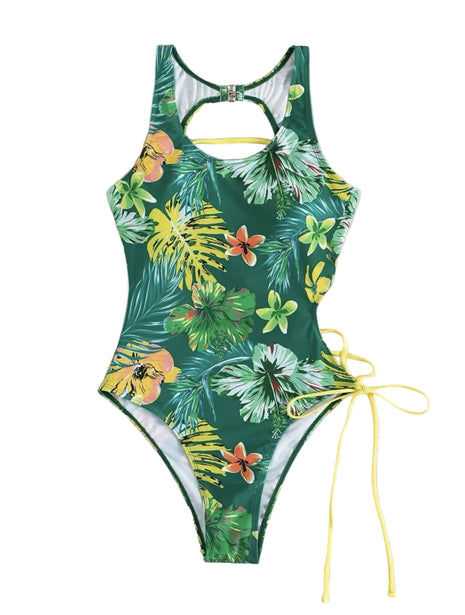 Tropical leaf patterned swimsuit with yellow accents on a white background