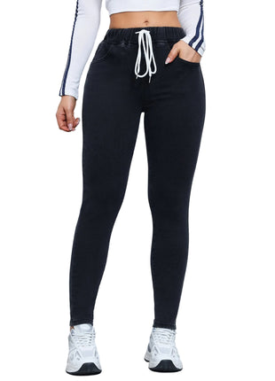 Women’s drawstring stretch denim trousers with elastic waist and slim fit winter design.