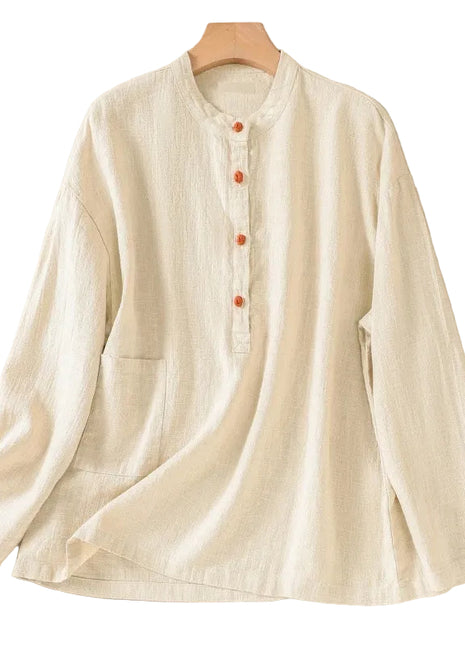 Women's Japanese-inspired cotton and linen pullover shirt featuring a stand-up collar, buckle detail, and loose fit.