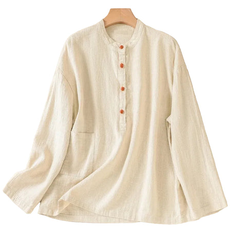 Women's Japanese-inspired cotton and linen pullover shirt featuring a stand-up collar, buckle detail, and loose fit.