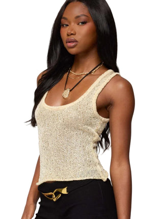 Women’s shiny sequin tank top with deep U neckline, sheer design, and slim fit silhouette.