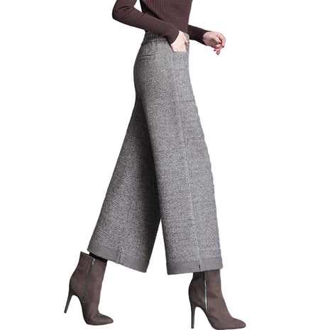 Women’s woolen wide leg cropped pants with high waist design and elegant urban style.