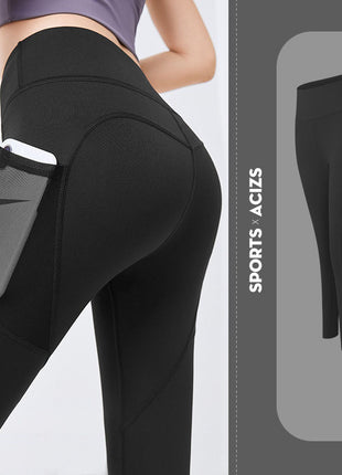 Black leggings with a pocket and Nike branding, on a light gray background.