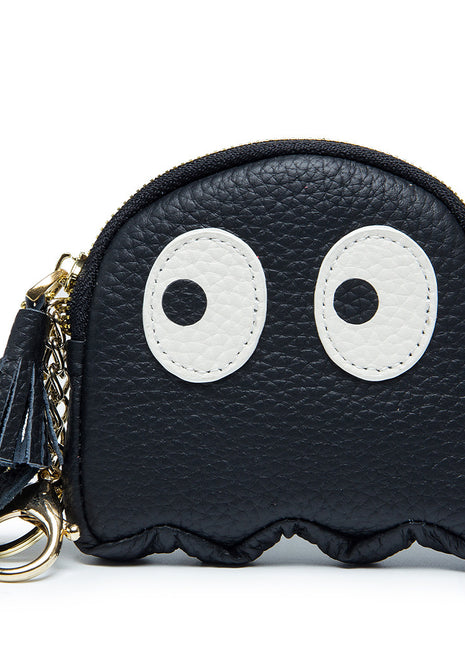 Women's compact genuine leather coin wallet with soft lining and urban style.