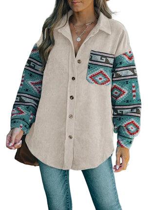 Women's long sleeve ethnic blouse styled with jeans for a relaxed everyday look.