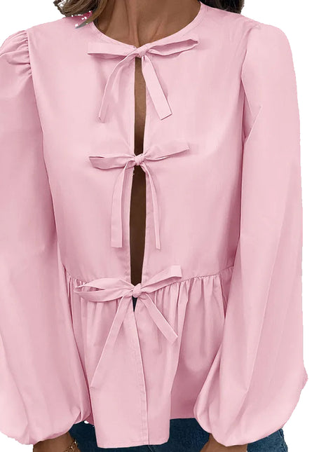 Women's loose-fit buckle shirt available in black, pink, white, and light blue for everyday casual fashion.