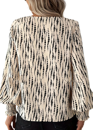 Women's loose-fit long sleeve shirt paired with jeans for a stylish street-inspired casual outfit.