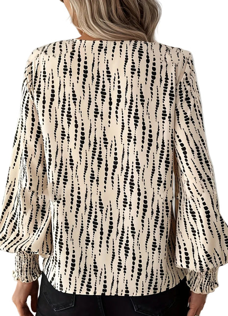 Women's loose-fit long sleeve shirt paired with jeans for a stylish street-inspired casual outfit.