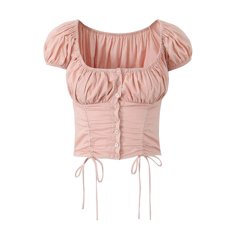 Women's pink drawstring crop top featuring lace trim, shell-style buttons, and a printed design.