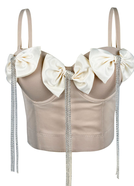 Women's polyester corset featuring medium-stretch fabric, decorative chain details, and a cropped silhouette.