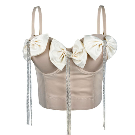 Women's polyester corset featuring medium-stretch fabric, decorative chain details, and a cropped silhouette.