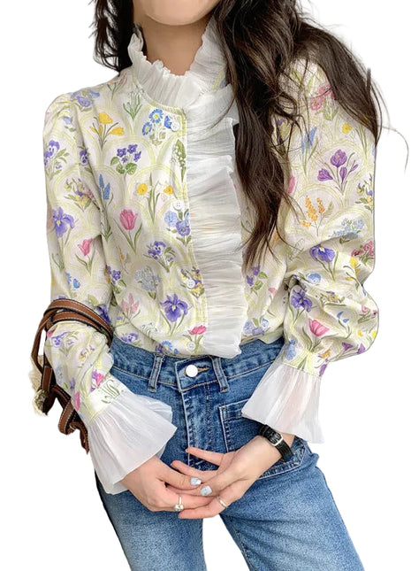 Women's romantic turtleneck blouse featuring ruffled flare sleeves, patchwork details, and a delicate off-white floral design.