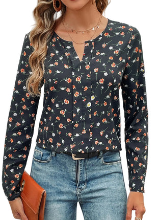 Women's slim-fit black floral pullover top paired with jeans for a stylish everyday outfit.