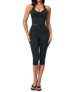 Women's slimming yoga outfit set featuring a sleeveless top and capri-length pants in soft nylon-spandex fabric.