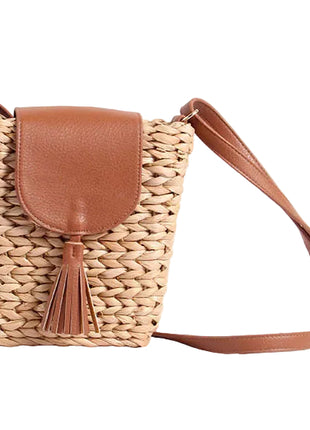 Women's trapezoid shoulder handbag featuring woven detailing, polyester lining, and a stylish single shoulder strap for everyday wear.