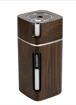 Wooden humidifier with silver accents on a white background