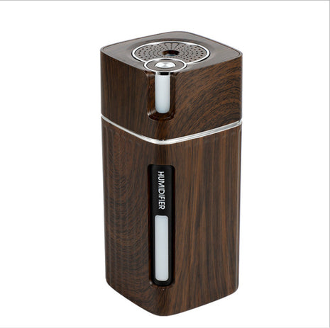 Wooden humidifier with silver accents on a white background